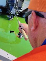 B’n’M Poles’ Sharpshooter 6 rod and a spinning reel spooled with 4-pound-test Hi-Vis Slime Line are standards for Russ Bailey when pontoon shooting. (Photo courtesy Russ Bailey)