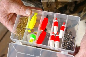 Crappie anglers who fish primarily with minnows may need only a small tackle box containing a few bobbers, sinkers and hooks.