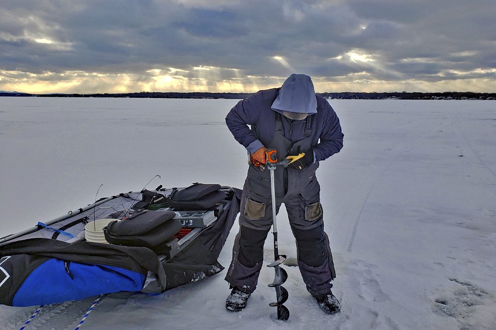 Striker Predator series bibs and the Otter XT Pro X-Over Lodge flip-over-style thermal shelter won’t come cheap, but they’ll keep you warm and toasty on the ice far longer, allowing you to catch more fish. (Photo: Ken Perrotte)