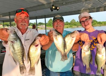 Veteran guide Steve Blake, the author, and his granddaughter, Caty Franklin, were all smiles after a successful trip on Truman Lake in Missouri.