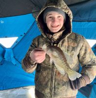 Fishing in a shelter is a great way to share bitterly cold days with the next generation of ice anglers. (Photo: Rob McDonald)