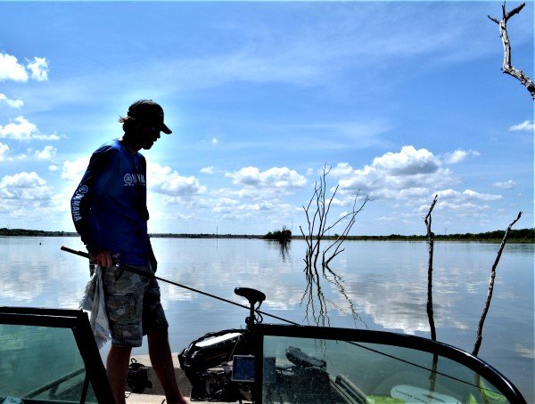 Flooded tree rows often lead to big crappie at Truman Lake in the heat of the summer.