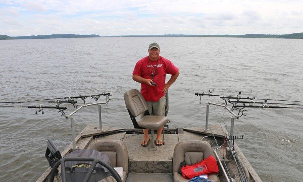 John Harrison pulls cranks out of the back of his boat. A MinnKota Terrova keeps the boat on track and can be controlled by remotely.