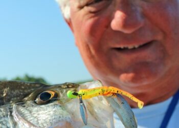 Dan Dannenmueller with a nice crappie caught on plastic tipped with a minnow. He says changing up sizes, colors and sometimes adding flash, can lead to more fish.