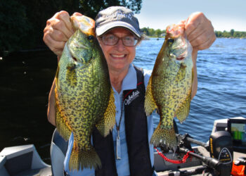 Marilyn Black with a brace of crappies from Conneaut Lake. (Photo: Darl Black)