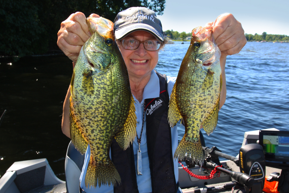 Marilyn Black with a brace of crappies from Conneaut Lake. (Photo: Darl Black)